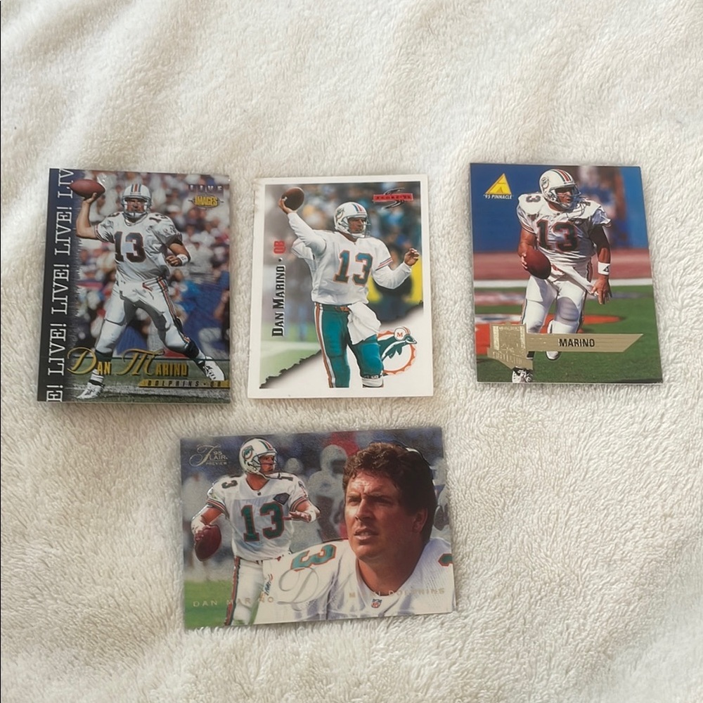 Lot of four Miami Dolphins Dan Marino trading cards